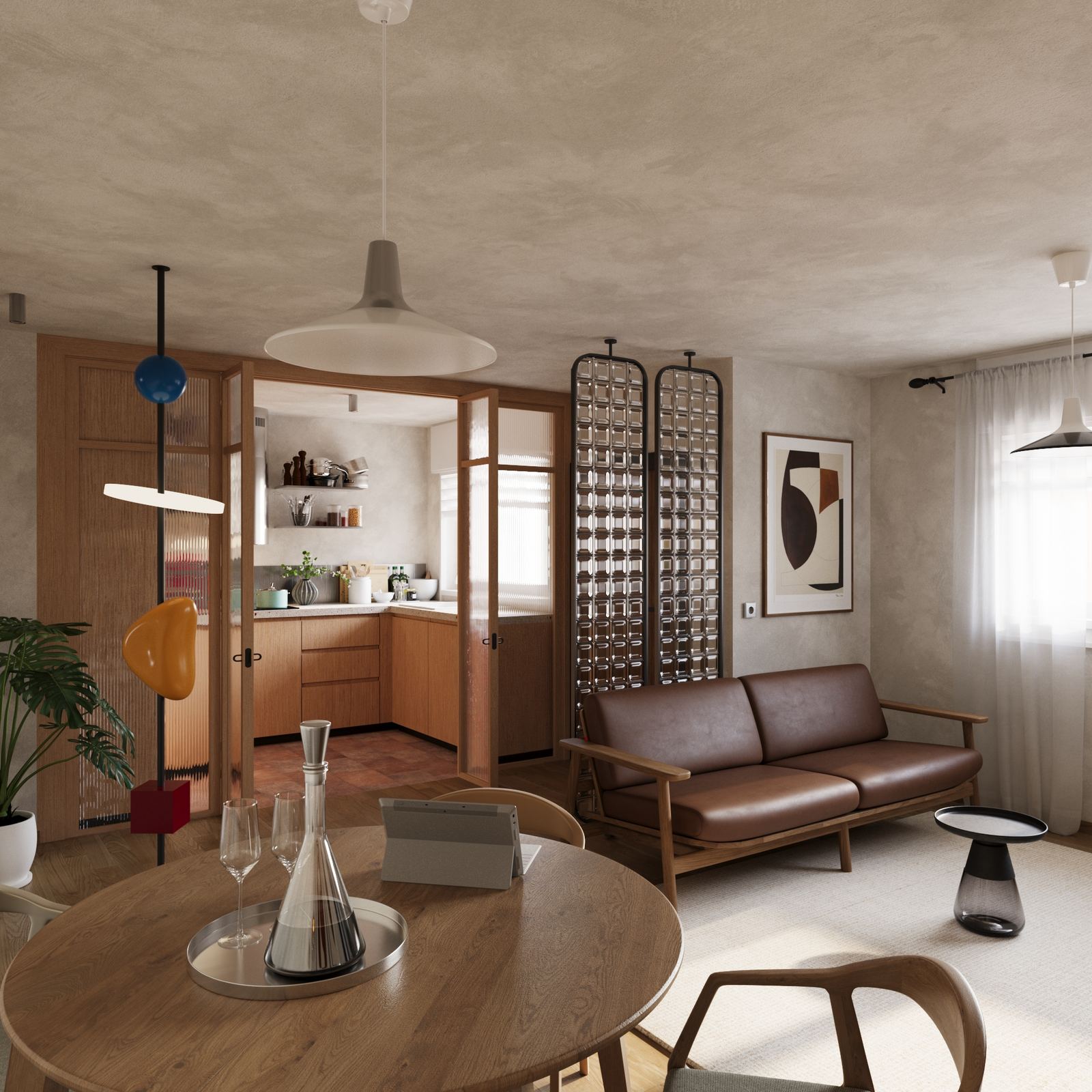 Open-plan space with dining, living, and kitchen areas arranged in sequence.  CAPTION: