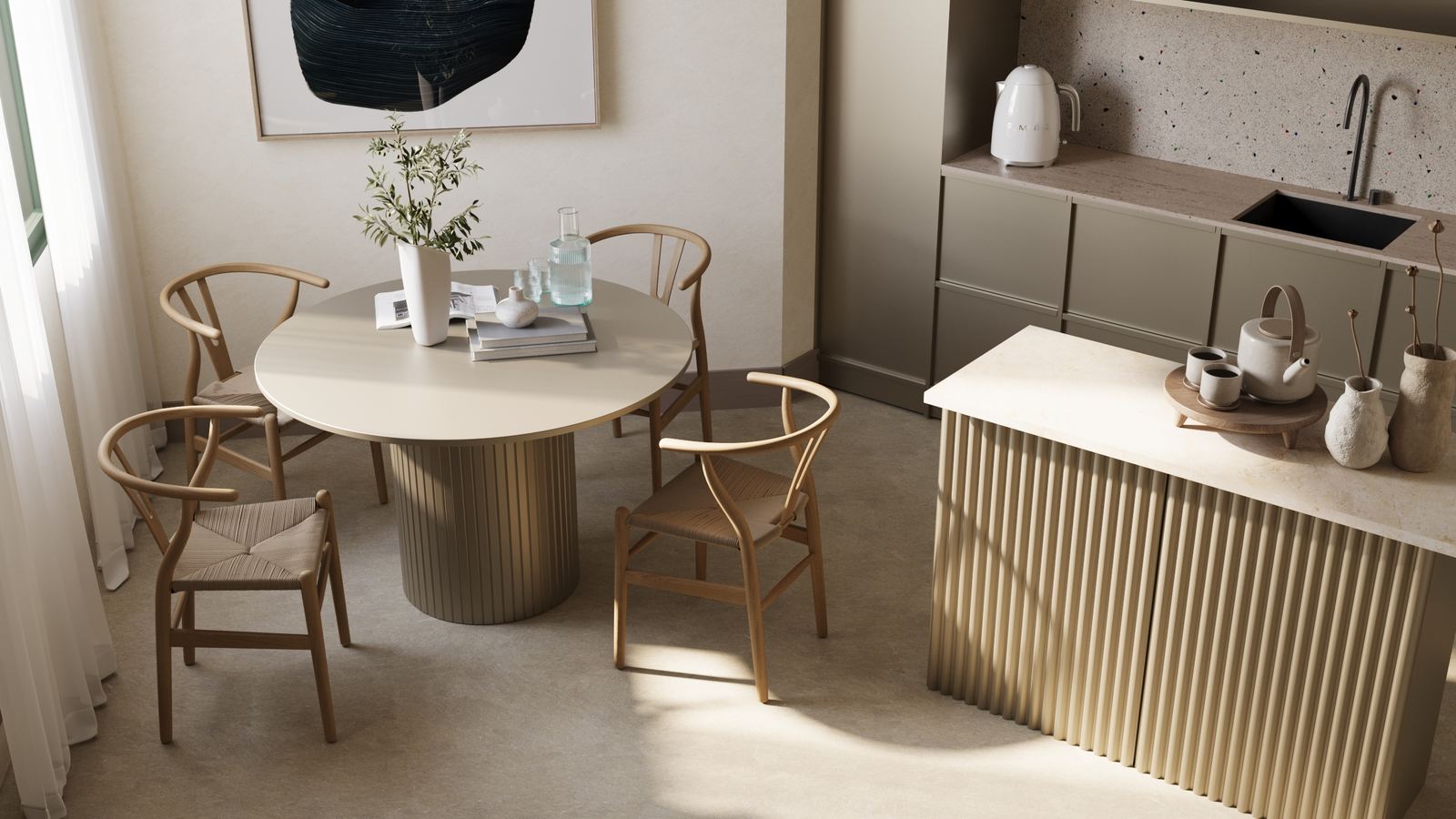 Dining area with round table, wooden chairs, and a compact kitchen with textured island in soft neutral tones.