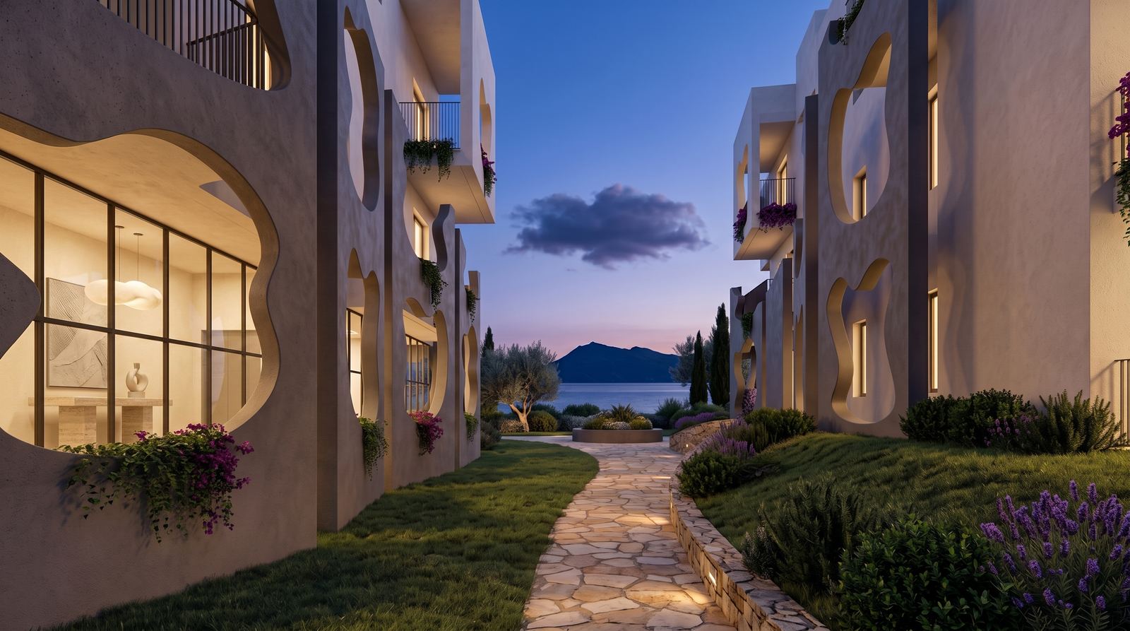 Stone walkway between organic residential facades leading toward the sea at twilight.