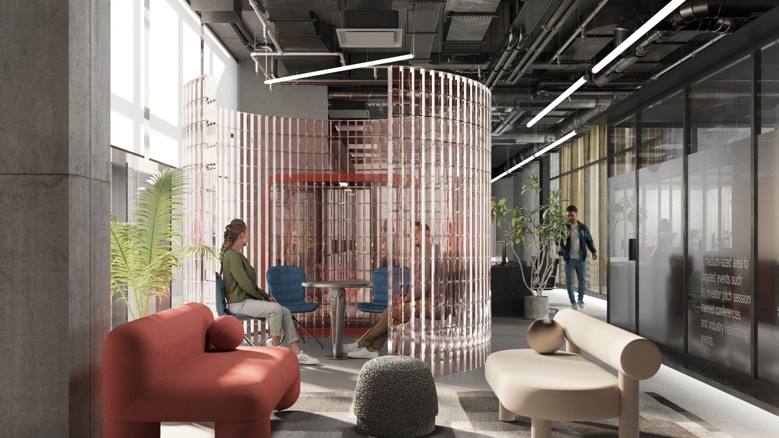 Office lounge with circular meeting pod and soft seating.