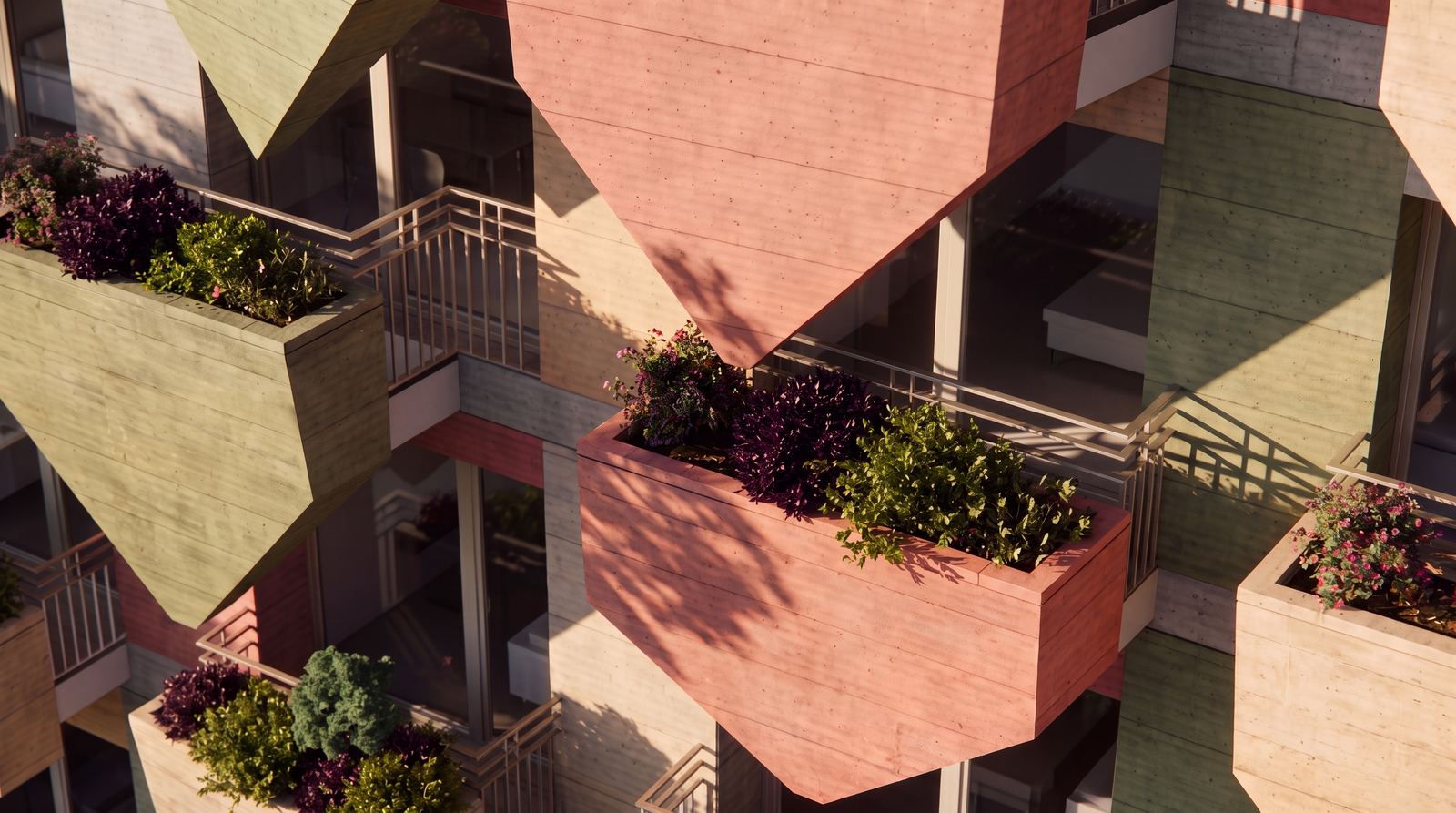 Overhead perspective of tinted concrete balustrades lined with lush greenery and metal railings.